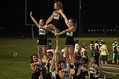 Cheerleading. I'm on the top.