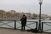 Seine River with a violinist