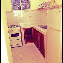 Casa adosada Privada de una habitacion y cocina