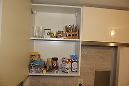 Furnished bedroom with window in the ground floor