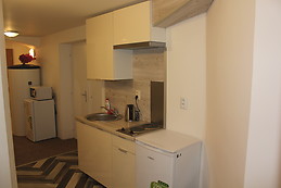 Furnished bedroom with window in the ground floor