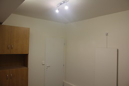 Furnished bedroom with window in the ground floor