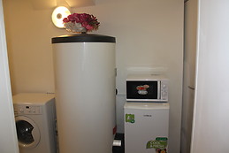 Furnished bedroom with window in the ground floor