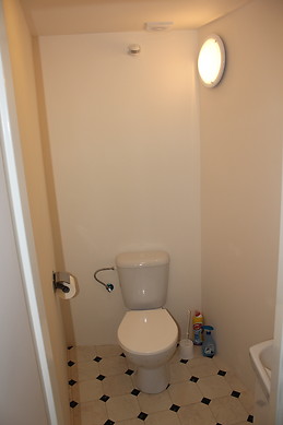 Furnished bedroom with window in the ground floor