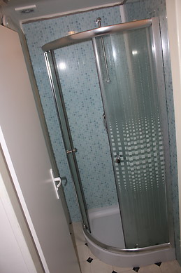 Furnished room with window in the ground floor in Smíchov