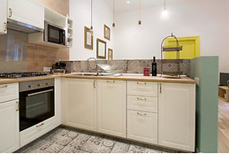 Industrial-chic renovated flat in the Palace District .