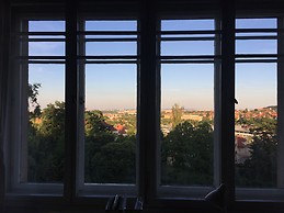 Large and sunny room in Prague with view on Prague Castle