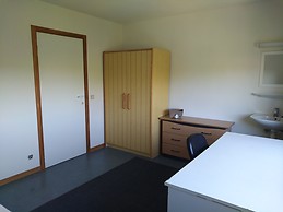 Light and white room with green vieuws, walking distance to the