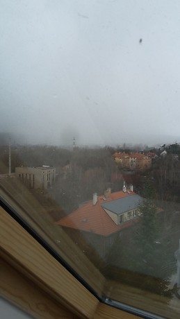 Quaint room with stunning views in sunny apartment.