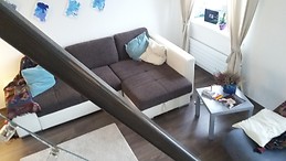 Quaint room with stunning views in sunny apartment.