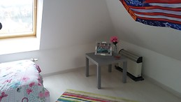 Quaint room with stunning views in sunny apartment.