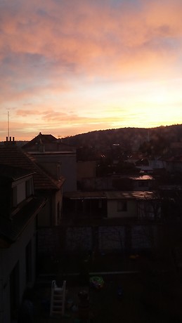 Quaint room with stunning views in sunny apartment.