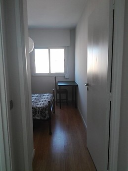 Quarto no centro da cidade