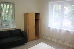 Separate furnished room with windows to forest in Smíchov