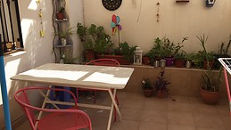 Sunny and big room in Malaga city center