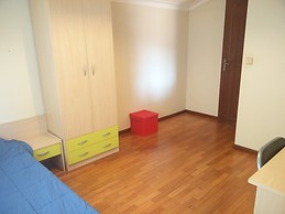 Sunny room with single bed and view to Bom Jesus