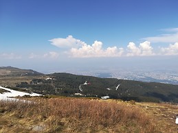 Watching the city from the mountains.