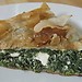 The preparation of a traditional spinach pie !