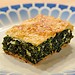 The preparation of a traditional spinach pie !
