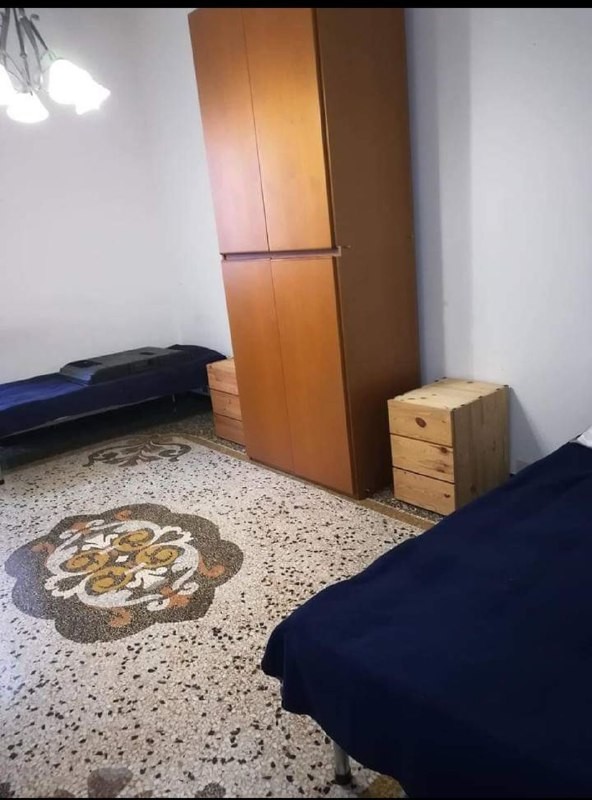 Room For Rent In 4 Bedroom Apartment In Genoa With Elevator And With Storage Area