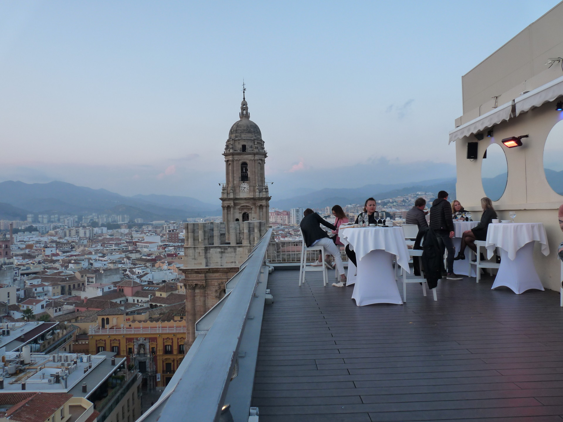 A panoramic view of Malaga city from the rooftop of AC Hotel Malaga Palacio with La Manquita in the backdrop.