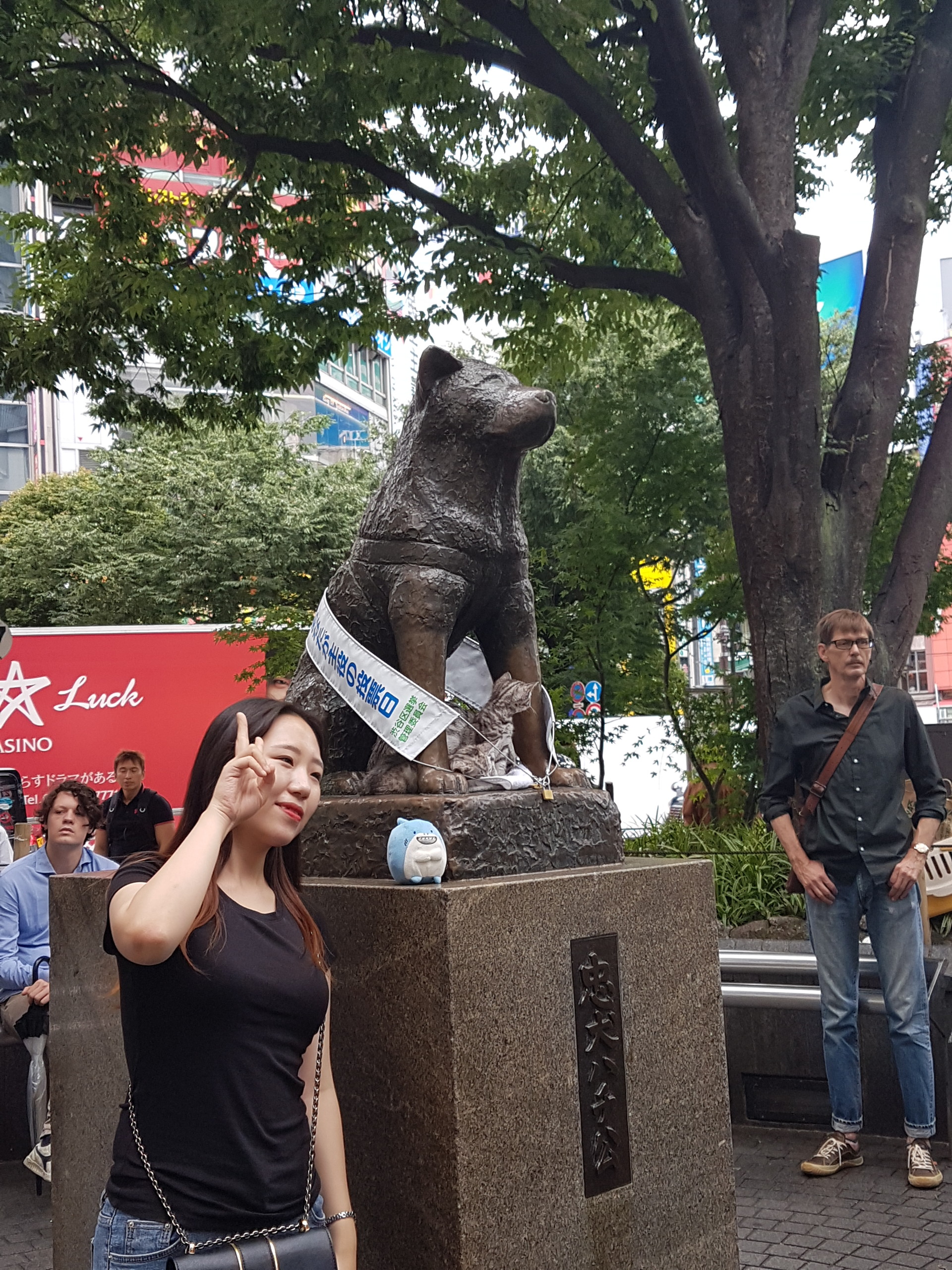 Japanese dog 2024 train station