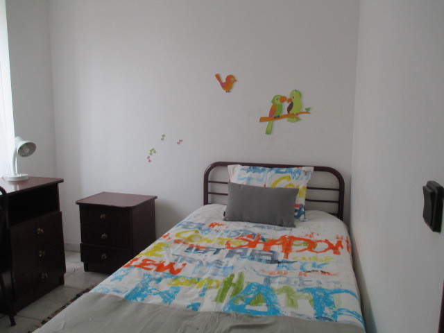 Quarto em casa a partilhar