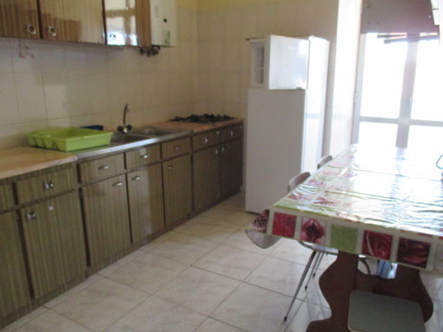 Quarto em casa a partilhar
