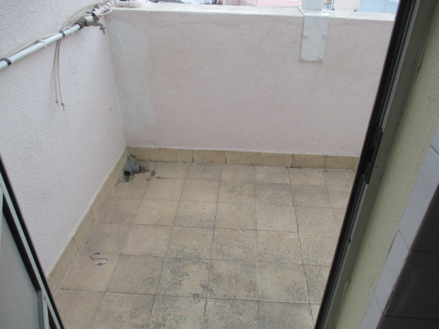 Quarto em casa a partilhar