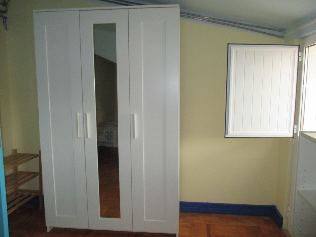 Quarto em casa a partilhar