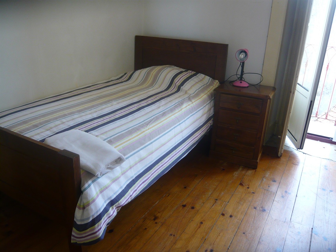 Quarto com varanda em casa com grande area de estar e terraçoà Praça da República, Coimbra